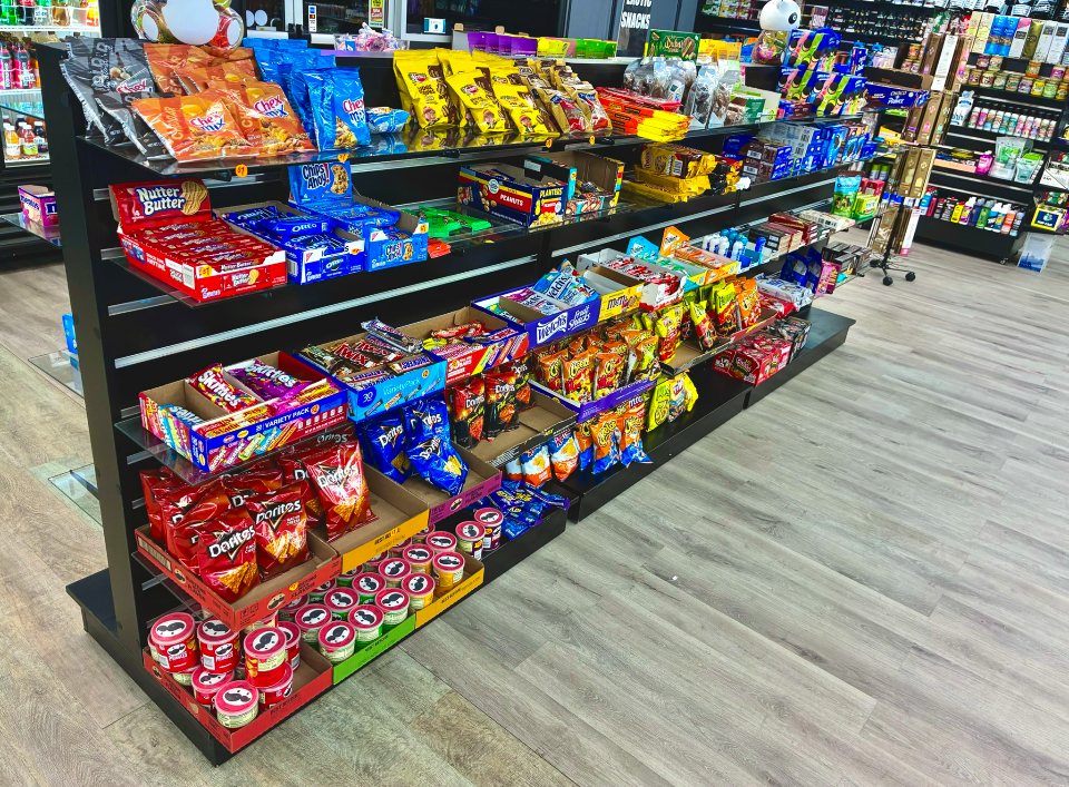 Exotic snacks and candy display at Best Puff Tobacco